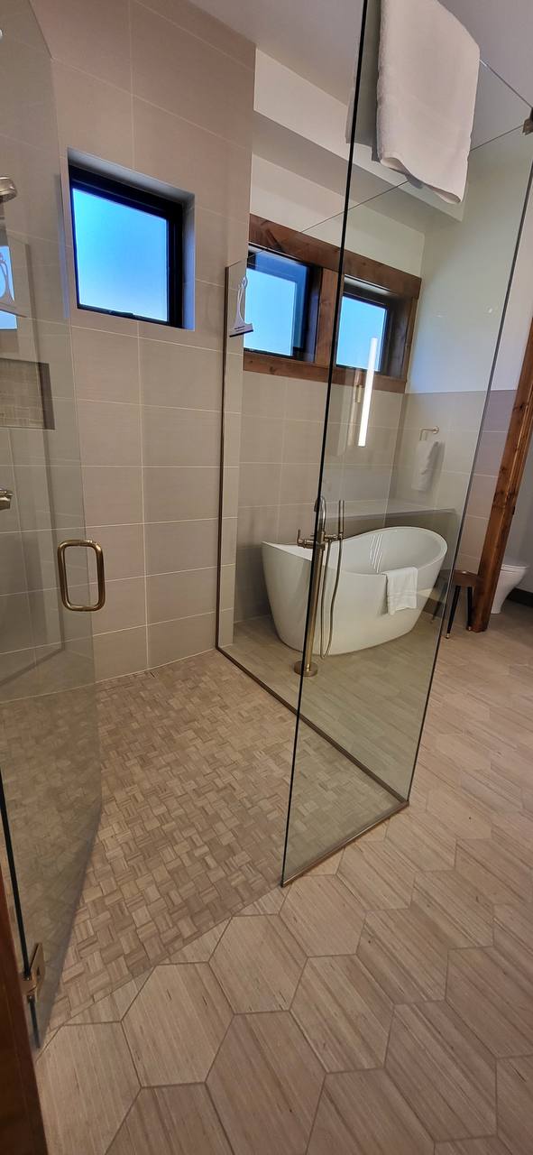 Glass shower with freestanding tub